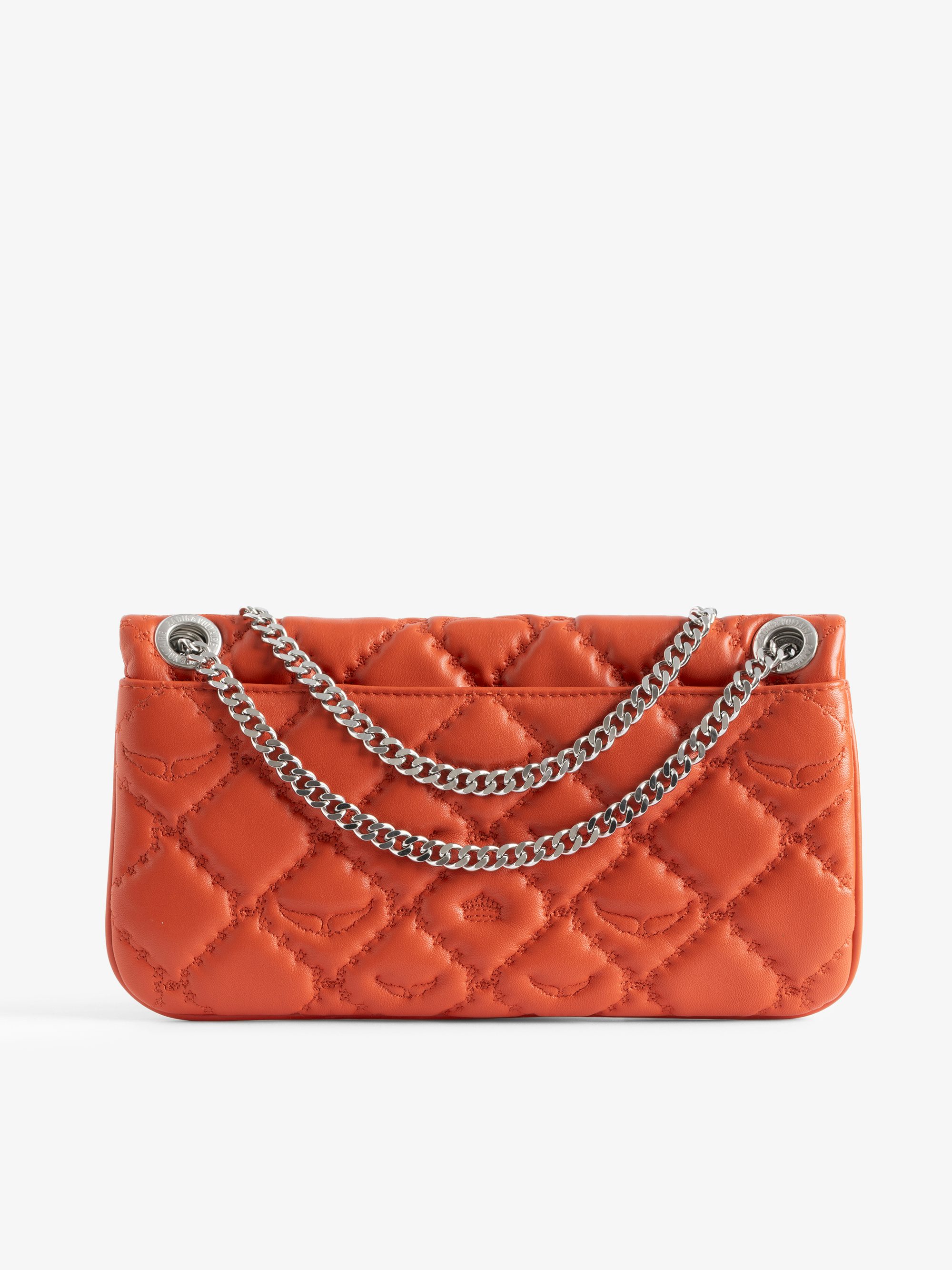 Rock II Quilted Monogram Clutch - Clutch in smooth quilted leather with sliding metal chain and signature wings.